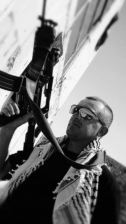 Instructor demonstrates working with a long M16 during an anti-terrorism course, Israel